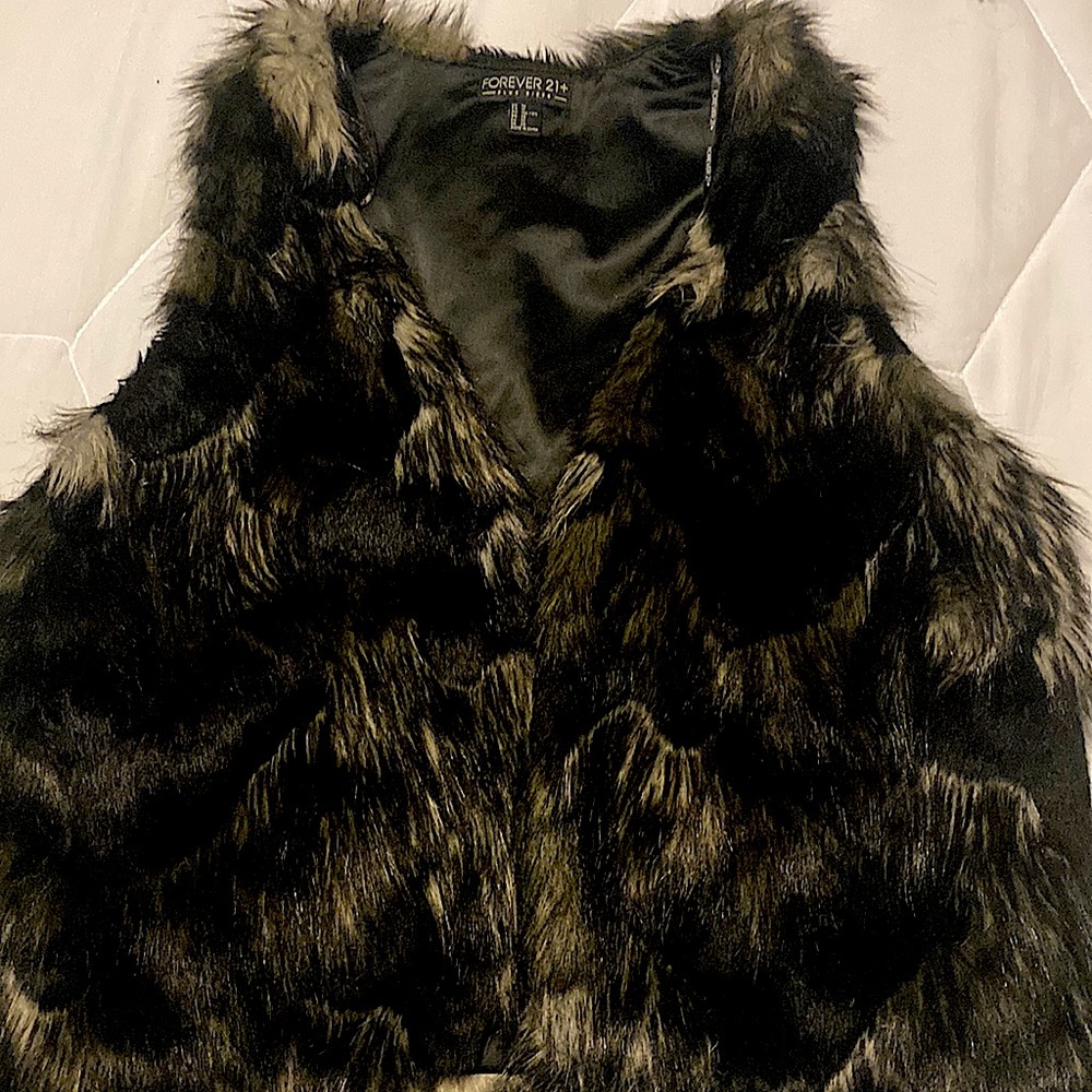 Faux Fur Vest, wore 1 time. Good quality.very nice.